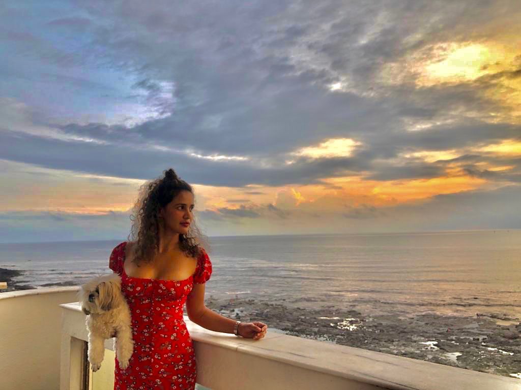 Aisha Sharma in short dress